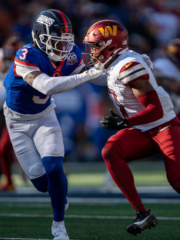 New York Giants cornerback Deonte Banks (3) plays defense on Washington Commanders wide receiver Terry McLaurin (17).