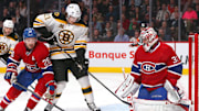 May 12, 2014; Montreal, Quebec, CAN; Montreal Canadiens defenseman Josh Gorges (26) helps goalie Carey Price (31) to make a save against Boston Bruins left wing Loui Eriksson (21) during the second period in the game six of the second round of the 2014 Stanley Cup Playoffs at Bell Centre. Mandatory Credit: Jean-Yves Ahern-Imagn Images