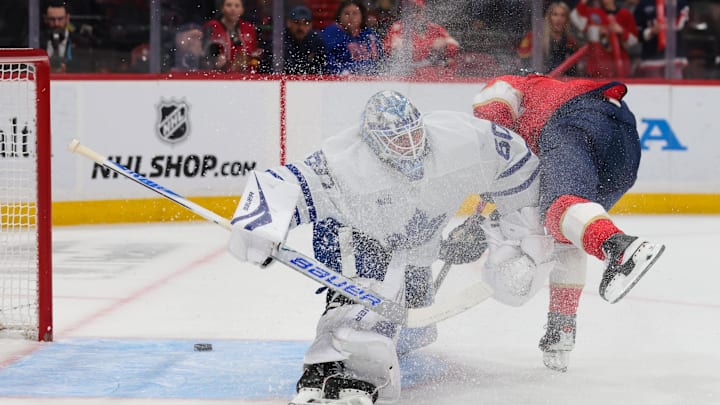 Feb 26, 2026; Sunrise, Florida, USA; Florida Panthers center Evan Rodrigues (17) scores against Toronto Maple Leafs goaltender Joseph Woll (60) during the first period at Amerant Bank Arena. Mandatory Credit: Sam Navarro-Imagn Images