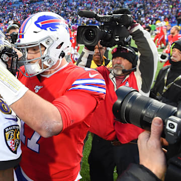 Dec 8, 2019; Orchard Park, NY, USA; Baltimore Ravens quarterback Lamar Jackson (8) greets Buffalo Bills quarterback Josh Allen (17) following the game at New Era Field. Mandatory Credit: Rich Barnes-Imagn Images