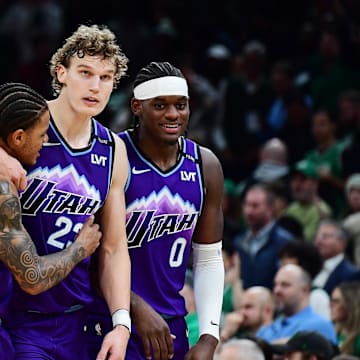 Nov 3, 2025; Boston, Massachusetts, USA; Utah Jazz guard Keyonte George (3), forward Lauri Markkanen (23), and forward Taylor Hendricks (0) react during the second half against the Boston Celtics at TD Garden. Mandatory Credit: Bob DeChiara-Imagn Images