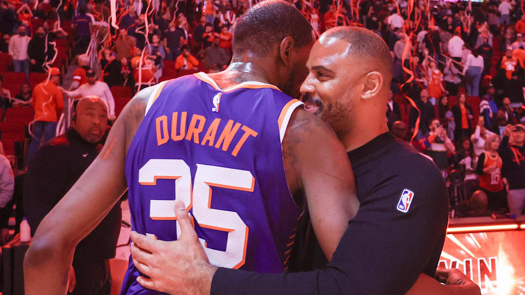  Phoenix Suns forward Kevin Durant (35) hugs Houston Rockets head coach Ime Udoka after a game at Toyota Center.