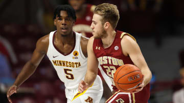 Dec 8, 2020; Minneapolis, Minnesota, USA; Boston College Eagles guard Rich Kelly (22) and Minnesota Golden Gophers guard Marcus Carr (5).