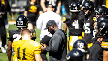 Apr 26, 2025; Iowa City, IA, USA; Iowa tight ends and fullbacks coach Abdul Hodge writes down notes during a spring NCAA football open practice at Kinnick Stadium. Mandatory Credit: Joseph Cress/For the Register