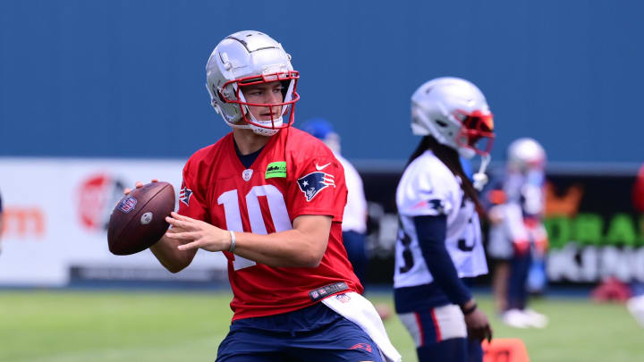 Jun 10, 2024; Foxborough, MA, USA;  New England Patriots quarterback Drake Maye (10) throws a pass at minicamp at Gillette Stadium. Mandatory Credit: Eric Canha-USA TODAY Sports