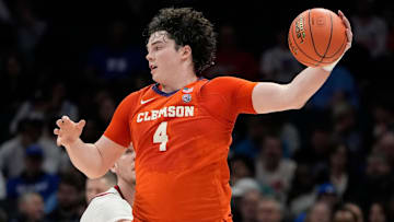 Mar 14, 2025; Charlotte, NC, USA; Clemson Tigers forward Ian Schieffelin (4) with the ball in the first half at Spectrum Center.