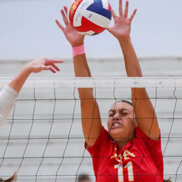 Divine Savior Holy Angels' Callie Carr (11) blocks a shot during a match in the 2025 Joust volleyball tournament at Homestead High School in Mequon, Wisconsin on Saturday, Aug. 30. 
