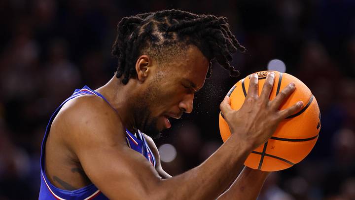 Mar 3, 2026; Tempe, Arizona, USA; Kansas Jayhawks guard Darryn Peterson (22) reacts against the Arizona State Sun Devils in the second half at Desert Financial Arena. Mandatory Credit: Mark J. Rebilas-Imagn Images