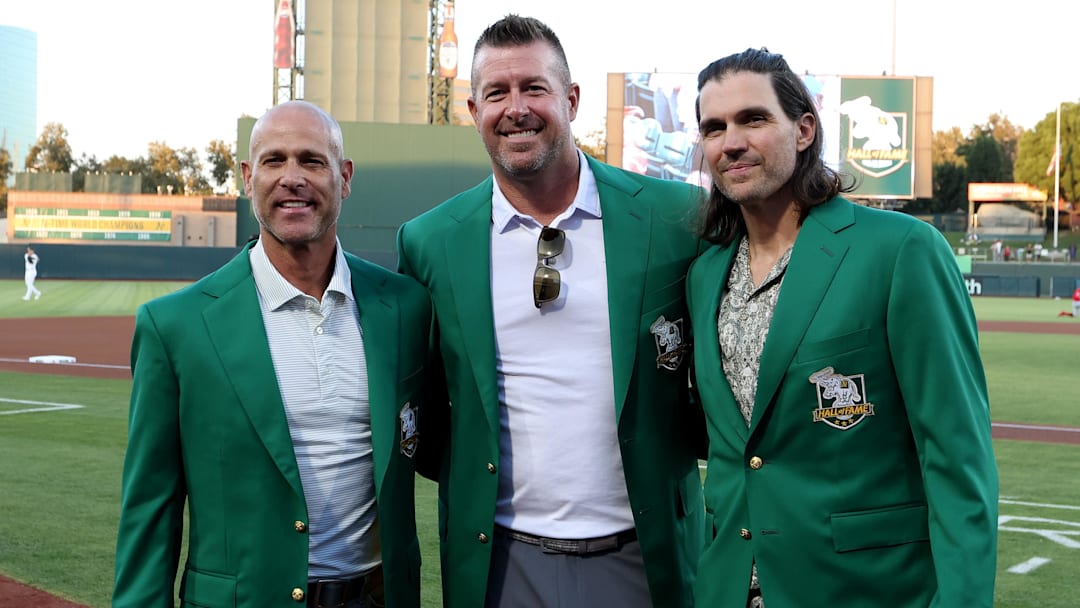 Sep 13, 2025; West Sacramento, California, USA;  Former Athletics pitchers from left to right (Tim Hudsun, Mark Mulder, and Barry Zito) pose for a photo before the start of a game against the Cincinnati Reds  at Sutter Health Park. Mandatory Credit: Dennis Lee-Imagn Images