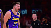 Feb 25, 2025; Los Angeles, California, USA; Los Angeles Lakers guard Luka Doncic (77) reacts against the Dallas Mavericks during the first quarter at Crypto.com Arena. Mandatory Credit: Gary A. Vasquez-Imagn Images