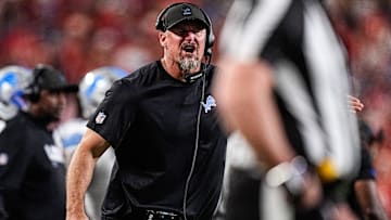 Detroit Lions head coach Dan Campbell talks to a referee before a play against Kansas City Chiefs during the first half at Arrowhead Stadium in Kansas City, Missouri on Sunday, Oct. 12, 2025.
