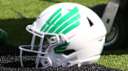 Sep 14, 2024; Lubbock, Texas, USA;  A North Texas Mean Green helmet on the turf in the first half during the game against the Texas Tech Red Raiders at Jones AT&T Stadium and Cody Campbell Field. Mandatory Credit: Michael C. Johnson-Imagn Images