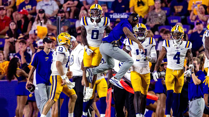 Sep 7, 2024; Baton Rouge, Louisiana, USA; LSU Tigers wide receiver Zavion Thomas (0) celebrates a touchdown against the Nicholls State Colonels during the second half at Tiger Stadium. Mandatory Credit: Stephen Lew-Imagn Images