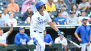 Florida Gators designated hitter Brody Donay (29) watches a grand slam against the Kentucky Wildcats