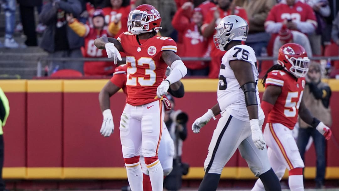 Dec 12, 2021; Kansas City, Missouri, USA; Kansas City Chiefs defensive back Armani Watts (23) celebrates after a defensive fumble recovery against the Las Vegas Raiders during the game at GEHA Field at Arrowhead Stadium. Mandatory Credit: Denny Medley-Imagn Images