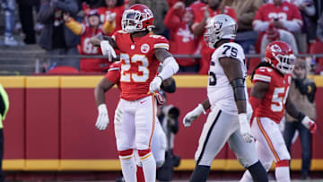 Dec 12, 2021; Kansas City, Missouri, USA; Kansas City Chiefs defensive back Armani Watts (23) celebrates after a defensive fumble recovery against the Las Vegas Raiders during the game at GEHA Field at Arrowhead Stadium. Mandatory Credit: Denny Medley-Imagn Images