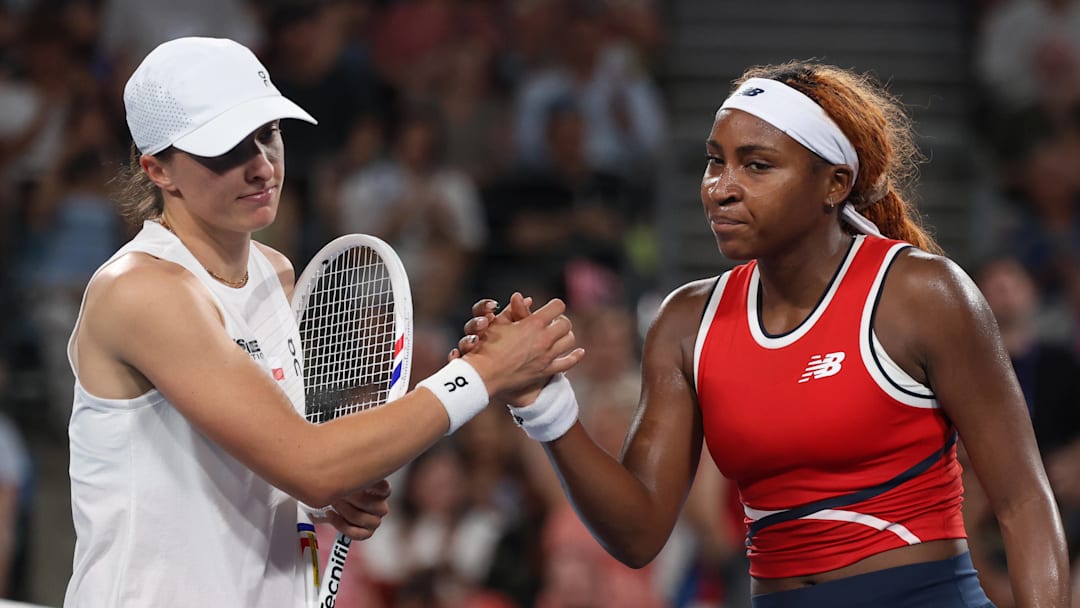 Iga Swiatek and Coco Gauff shake hands after their match at the United Cup.