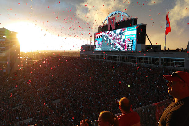 Balloons drift skyward after the Huskers' first touchdown of the 2016 season.