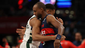 Former teammates Milwaukee Bucks forward Giannis Antetokounmpo and Washington Wizards forward Khris Middleton hug prior to their game at Capital One Arena on February 21.