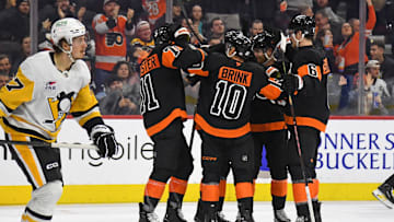 Feb 25, 2025; Philadelphia, Pennsylvania, USA; Philadelphia Flyers right wing Bobby Brink (10) celebrates his goal with teammates against the Pittsburgh Penguins during the second period at Wells Fargo Center.