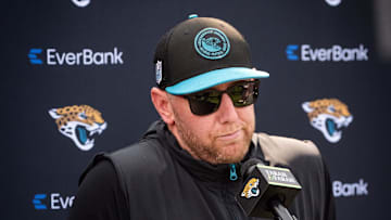 Jacksonville Jaguars head coach Liam Coen shrugs his shoulders while answering questions during a press conference after the seventh organized team activity at the Miller Electric Center in Jacksonville, Fla. Monday, June 2, 2025. [Doug Engle/Florida Times-Union]