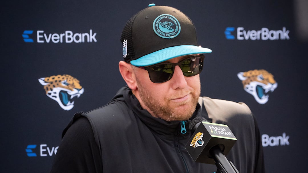 Jacksonville Jaguars head coach Liam Coen shrugs his shoulders while answering questions during a press conference after the seventh organized team activity at the Miller Electric Center in Jacksonville, Fla. Monday, June 2, 2025. [Doug Engle/Florida Times-Union]