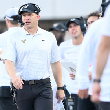 Oct 5, 2024; Nashville, Tennessee, USA;  Vanderbilt Commodores head coach Clark Lea paces up and down the sidelines against the Alabama Crimson Tide during the second half at FirstBank Stadium. Mandatory Credit: Steve Roberts-Imagn Images