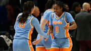 Tennessee guard Jewel Spear (0) and Tennessee guard Avery Strickland (13) celebrate after winning a college basketball game against Florida State at Thompson-Boling Arena at Food City Center in Knoxville, Tenn., on Wednesday, Dec. 4, 2024.