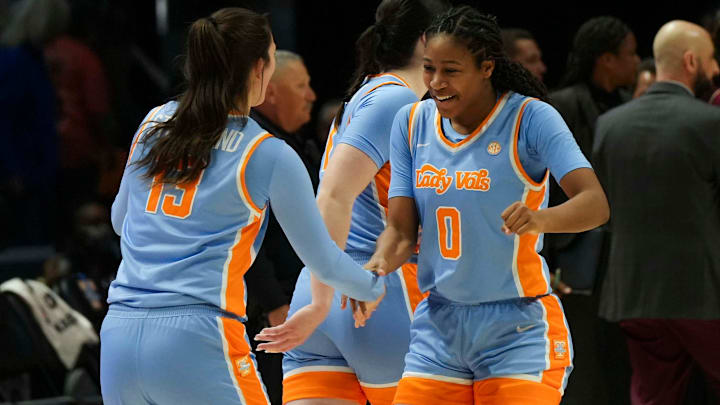 Tennessee guard Jewel Spear (0) and Tennessee guard Avery Strickland (13) celebrate after winning a college basketball game against Florida State at Thompson-Boling Arena at Food City Center in Knoxville, Tenn., on Wednesday, Dec. 4, 2024.