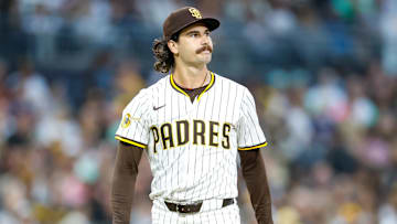 San Diego Padres starting pitcher Dylan Cease (84) reacts after walking a batter during the fourth inning against the Colorado Rockies at Petco Park. Mandatory Credit: David Frerker-Imagn Images