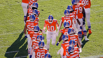 Jan 5, 2025; Denver, Colorado, USA; Denver Broncos quarterback Bo Nix (10) runs out during player introductions before the game against the Kansas City Chiefs at Empower Field at Mile High. 