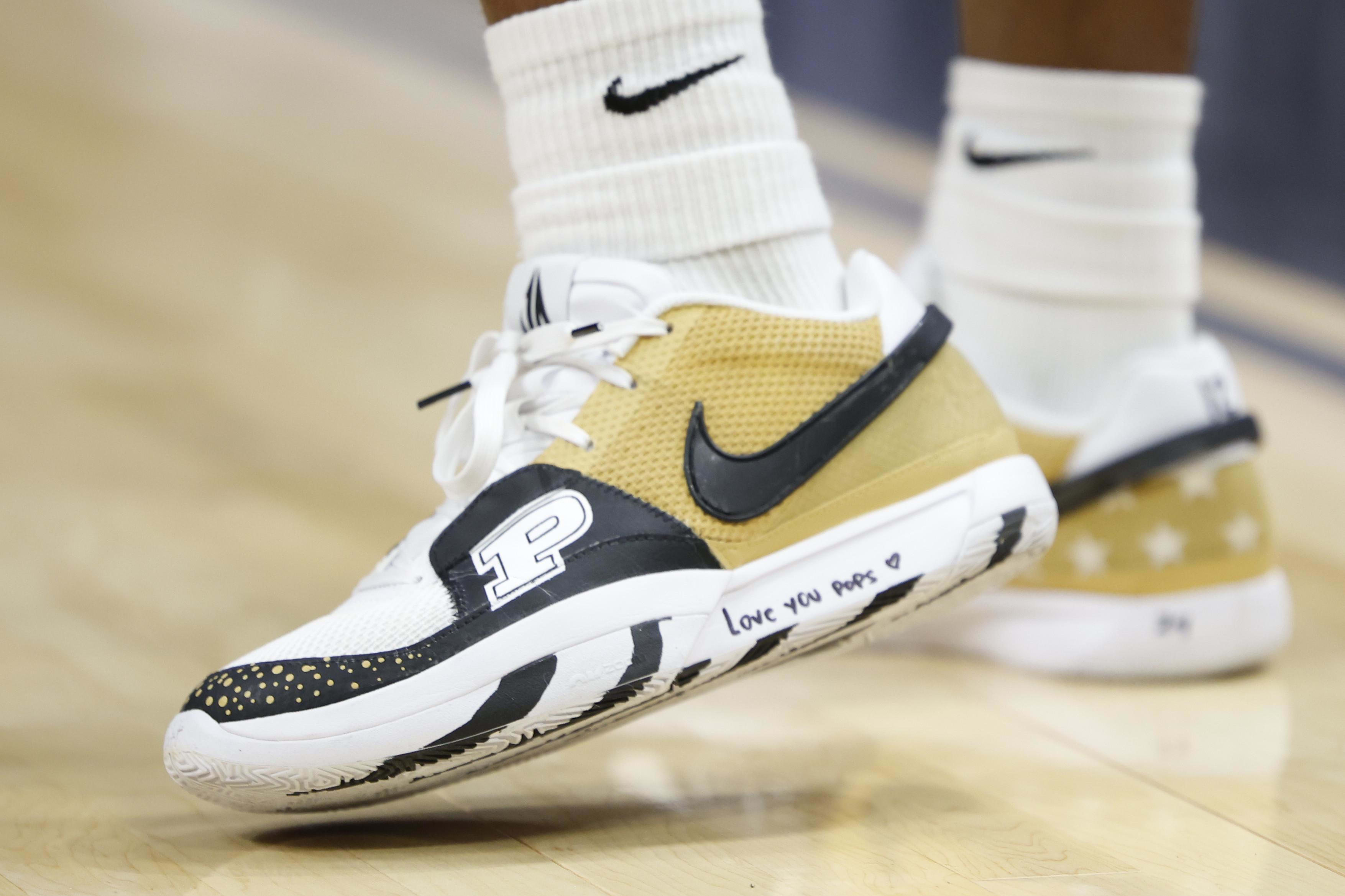 Purdue Boilermakers guard Lance Jones' white and black Nike sneakers.