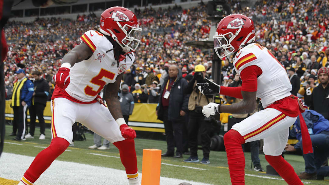 Dec 25, 2024; Pittsburgh, Pennsylvania, USA;  Kansas City Chiefs wide receiver Xavier Worthy (right) celebrates his touchdown with wide receiver Hollywood Brown (5) against the Pittsburgh Steelers during the first quarter at Acrisure Stadium. Mandatory Credit: Charles LeClaire-Imagn Images