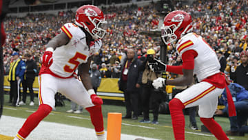 Dec 25, 2024; Pittsburgh, Pennsylvania, USA;  Kansas City Chiefs wide receiver Xavier Worthy (right) celebrates his touchdown with wide receiver Hollywood Brown (5) against the Pittsburgh Steelers during the first quarter at Acrisure Stadium. Mandatory Credit: Charles LeClaire-Imagn Images
