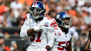 Sep 22, 2024; Cleveland, Ohio, USA; New York Giants linebacker Bobby Okereke (58) and New York Giants linebacker Azeez Ojulari (51) celebrate after a sack during the first quarter against the Cleveland Browns at Huntington Bank Field. Mandatory Credit: Ken Blaze-Imagn Images