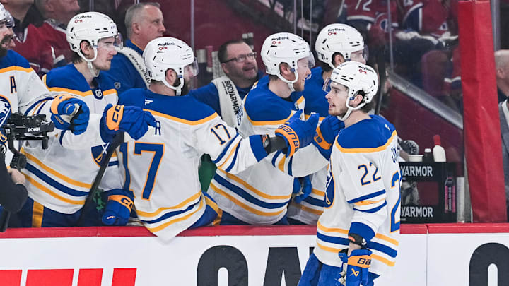 May 16, 2026; Montreal, Quebec, CAN; Buffalo Sabres right wing Jack Quinn (22) celebrates his second goal of the game with his teammates at the bench against the Montreal Canadiens during the third period in game six of the second round of the 2026 Stanley Cup Playoffs at Bell Centre. Mandatory Credit: David Kirouac-Imagn Images