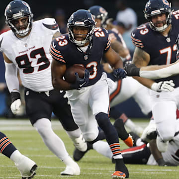 Roschon Johnson carries against the Texans in the Hall of Fame Game on Aug. 1. Johnson was inactive in the opener after a toe injury but could be active Sunday night in Houston.