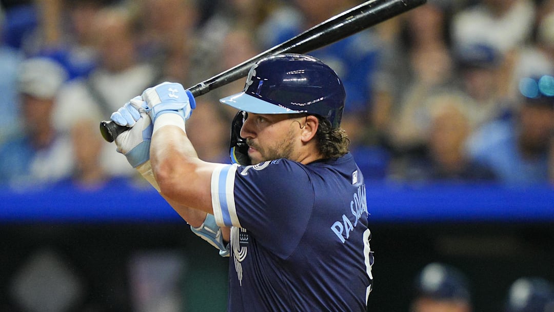Sep 19, 2025; Kansas City, Missouri, USA; Kansas City Royals first baseman Vinnie Pasquantino (9) hits an RBI single during the third inning against the Toronto Blue Jays at Kauffman Stadium. Mandatory Credit: Jay Biggerstaff-Imagn Images