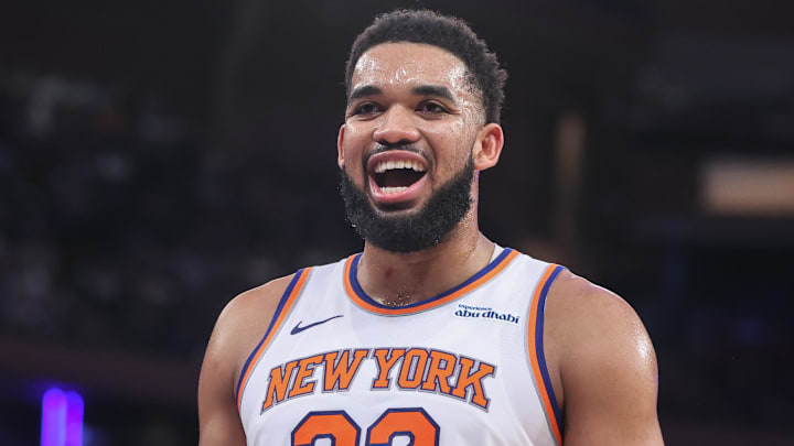 Feb 12, 2025; New York, New York, USA;  New York Knicks center Karl-Anthony Towns (32) reacts after getting called for a foul in the second quarter against the Atlanta Hawks at Madison Square Garden. Mandatory Credit: Wendell Cruz-Imagn Images