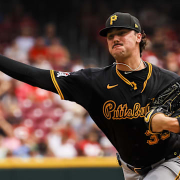 Sep 22, 2024; Cincinnati, Ohio, USA; Pittsburgh Pirates starting pitcher Paul Skenes (30) pitches against the Cincinnati Reds in the third inning at Great American Ball Park. Mandatory Credit: Katie Stratman-Imagn Images