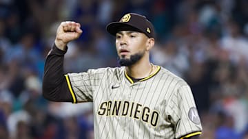 Aug 26, 2025; Seattle, Washington, USA; San Diego Padres pitcher Robert Suarez (75) reacts following the final out against the Seattle Mariners at T-Mobile Park. Mandatory Credit: Joe Nicholson-Imagn Images