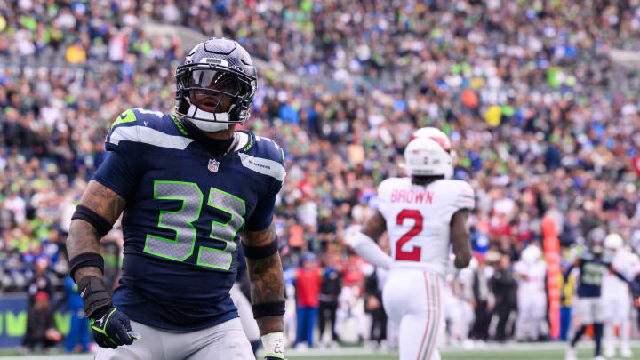 Oct 22, 2023; Seattle, Washington, USA; Seattle Seahawks safety Jamal Adams (33) celebrates after making a play against the Arizona Cardinals during the game at Lumen Field. Mandatory Credit: Steven Bisig-USA TODAY Sports