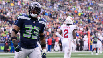 Oct 22, 2023; Seattle, Washington, USA; Seattle Seahawks safety Jamal Adams (33) celebrates after making a play against the Arizona Cardinals during the game at Lumen Field. Mandatory Credit: Steven Bisig-USA TODAY Sports