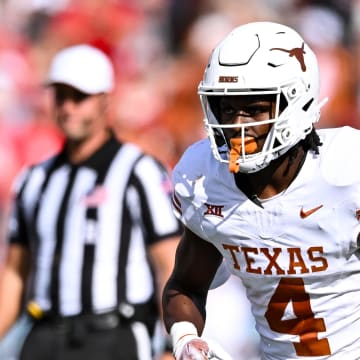 Oct 21, 2023; Houston, Texas, USA; Texas Longhorns running back CJ Baxter (4) in action during the first quarter against the Houston Cougars at TDECU Stadium. Mandatory Credit: Maria Lysaker-USA TODAY Sports