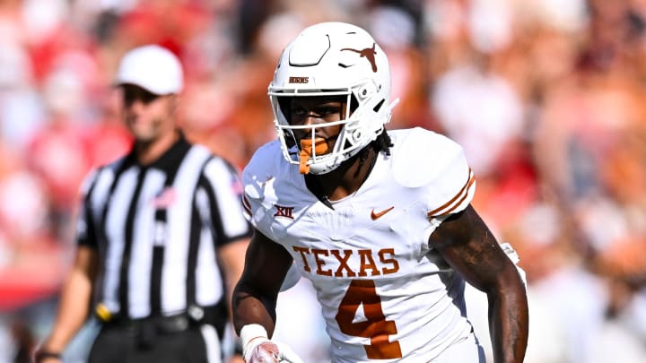 Oct 21, 2023; Houston, Texas, USA; Texas Longhorns running back CJ Baxter (4) in action during the first quarter against the Houston Cougars at TDECU Stadium. Mandatory Credit: Maria Lysaker-USA TODAY Sports