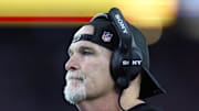 Washington Commanders head coach Dan Quinn reacts during the first half against the New England Patriots.