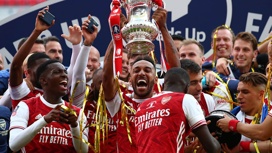 Pierre-Emerick Aubameyang lifts the FA Cup for Arsenal in 2020.