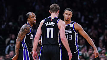 Jan 10, 2025; Boston, Massachusetts, USA; Sacramento Kings forward DeMar DeRozan (10), forward Keegan Murray (13) and forward Domantas Sabonis (11) react after defeating the Boston Celtics at TD Garden. Mandatory Credit: David Butler II-Imagn Images