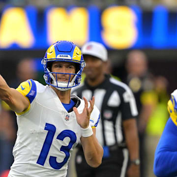 Aug 9, 2025; Inglewood, California, USA;  Los Angeles Rams quarterback Stetson Bennett IV (13) throws a pass during the second half against the Dallas Cowboys at SoFi Stadium. Mandatory Credit: Jayne Kamin-Oncea-Imagn Images