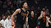 Mar 12, 2025; Indianapolis, IN, USA; USC Trojans guard Desmond Claude (1) celebrates after a play during the second half against the Rutgers Scarlet Knights at Gainbridge Fieldhouse. Mandatory Credit: Robert Goddin-Imagn Images